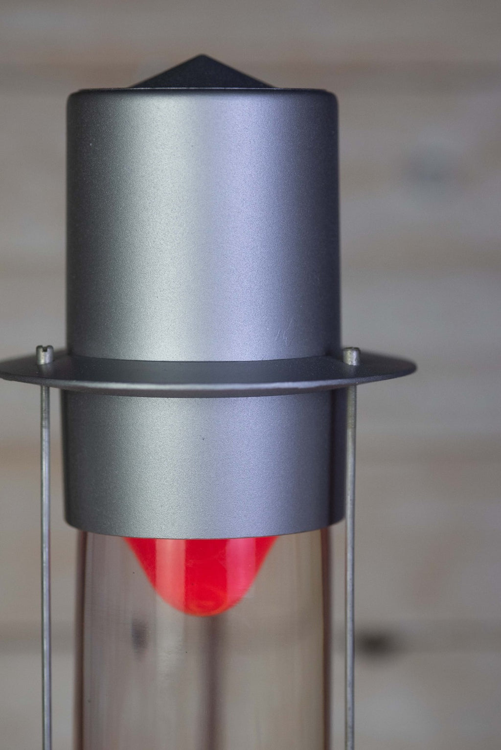 Upper aluminum rocket cap and red wax detail on the Raduga lava lamp