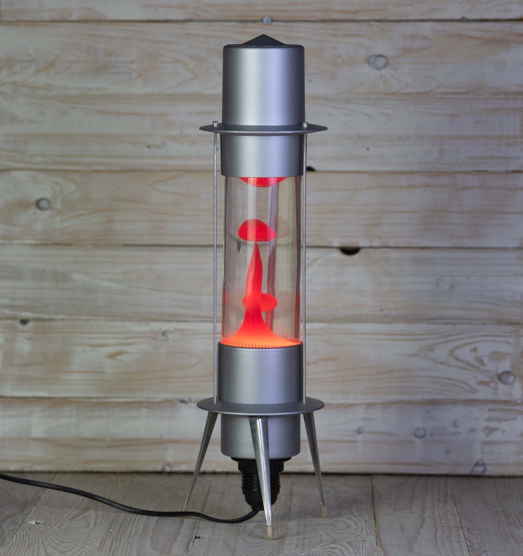 Full-length vintage Soviet Raduga lava lamp illuminated with red wax